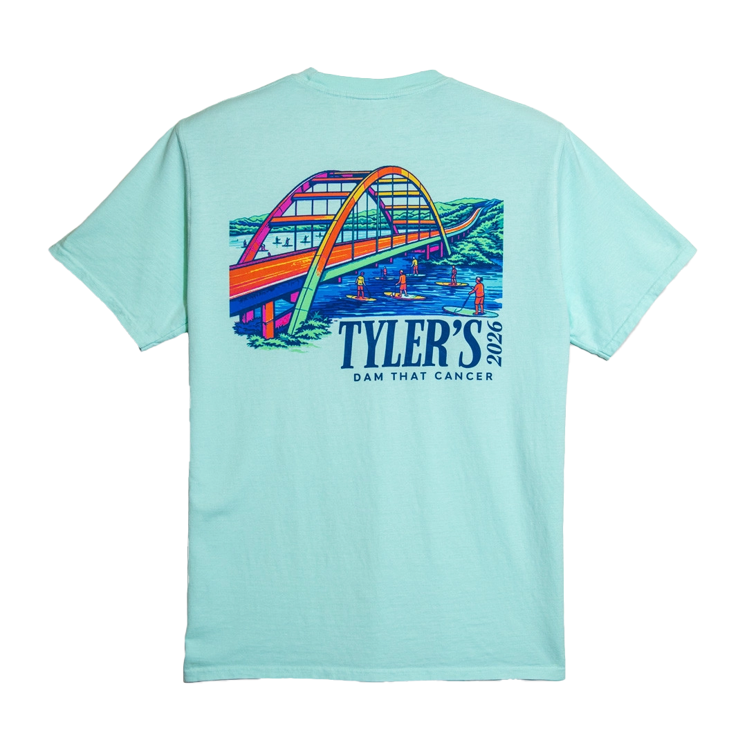 Light blue t-shirt featuring a colorful graphic of a bridge and 