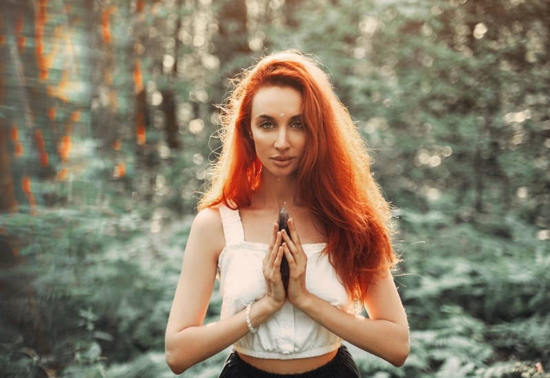 woman holding crystal