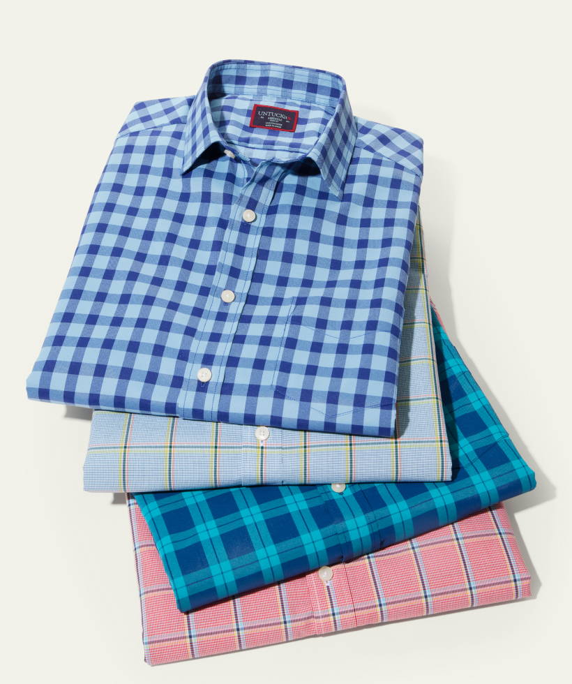 Stack of UNTUCKit Wrinkle-Free Shirts