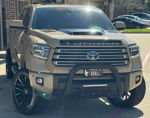 Front three-quarter LaQuentin's tan 2020 Toyota Tundra bull bar LED lights QBALL Texas TRD plate lifted DROPSTARS wheels Conductor's Special 844 Nightmare Edition featured customer install gallery photo 1
