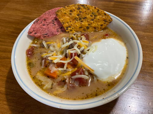 Elk nacho soup in a bowl