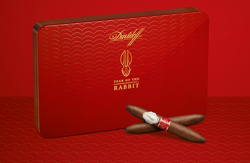 Davidoff Year of the Rabbit cigar box with crossed Perfecto cigars in front.