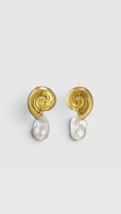Gold spiral earrings with white pearl drops.