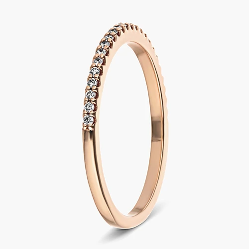 half eternity diamond accented stackable ring in 14k rose gold shown on side