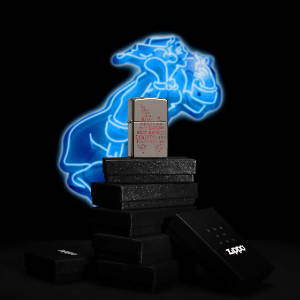 Typographic Zippo Flame Art Design standing on a stack of lighter boxes with a neon Windy in the background.