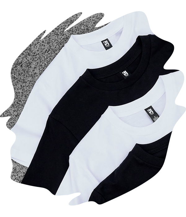 Neatly stacked black and white t-shirts ready for production