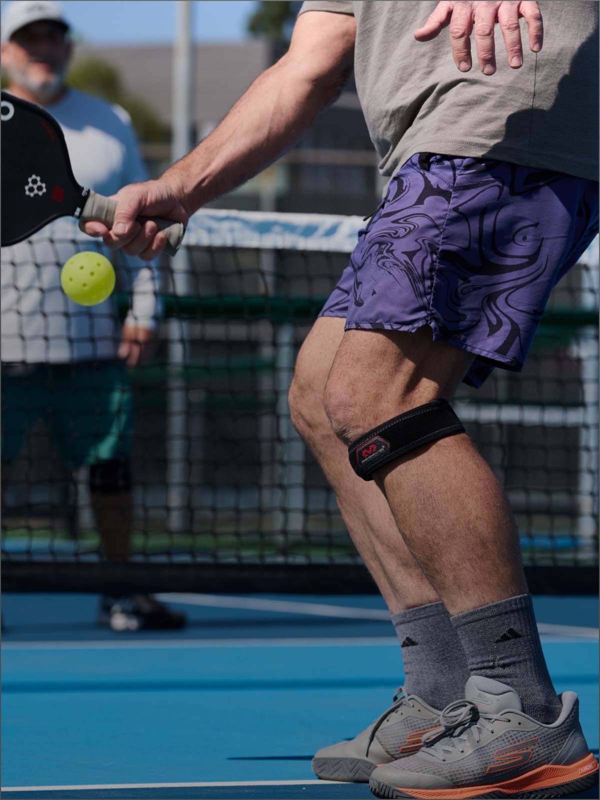 Pickleball Athlete Wearing McDavid Knee Strap/Patella