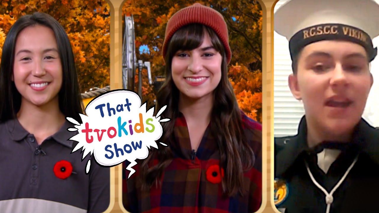 Three young people smiling, with 
