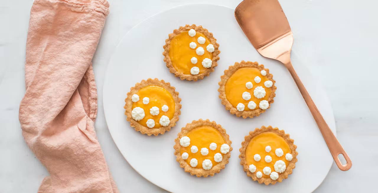 grapefruit curd tartlets on platter