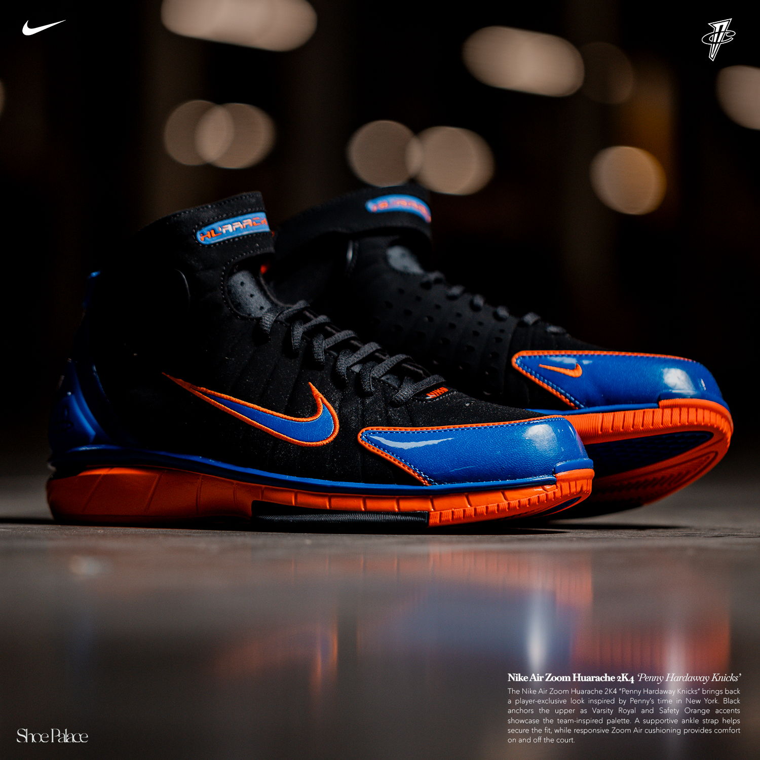 Nike basketball shoes in black, blue, and orange, displayed on a reflective surface.
