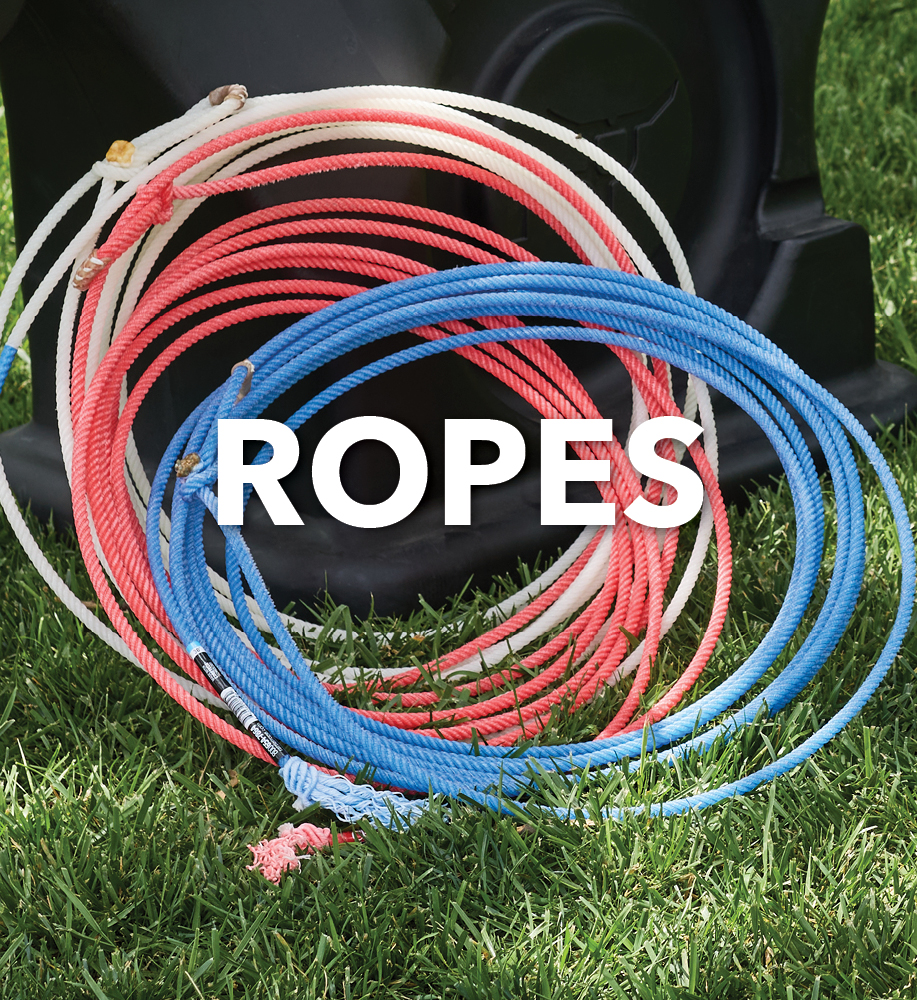 Ropes in red and blue coiled on grass with text overlay.