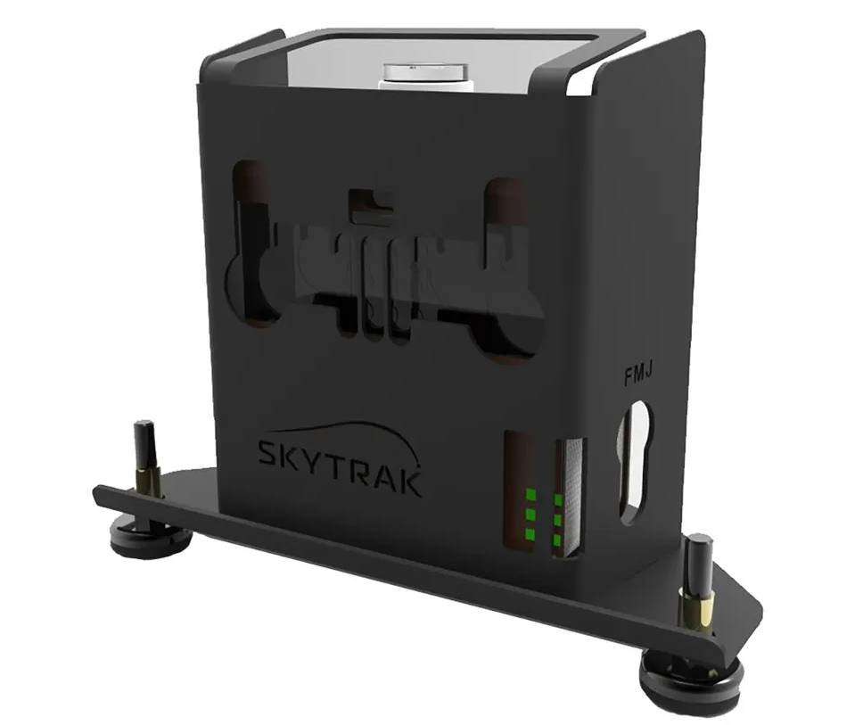 The SkyTrak golf launch monitor in the SkyTrak metal protective case