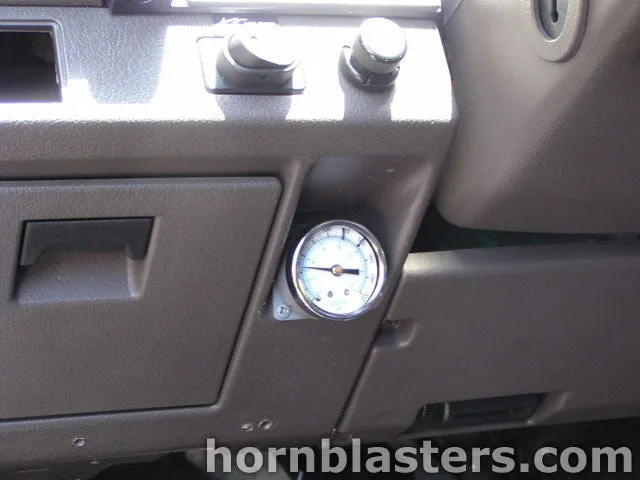 Onboard air setup showing compressor tank fittings and plumbing for Leigh's Shocker XL Frontier install photo 7