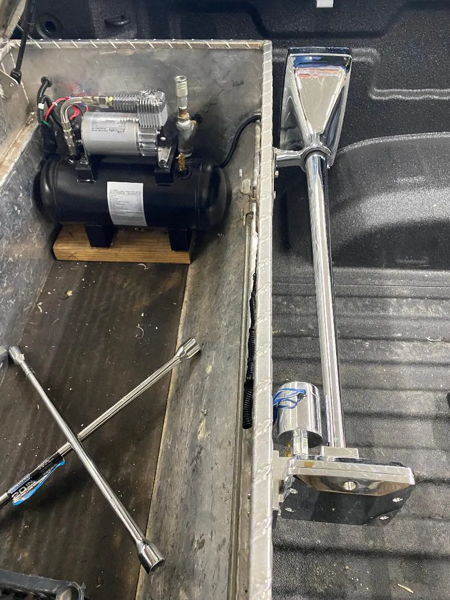 Chrome Mother Trucker 127H air horn with black compressor and tank mounted in Edward's 2022 Chevy 2500 truck bed photo 2