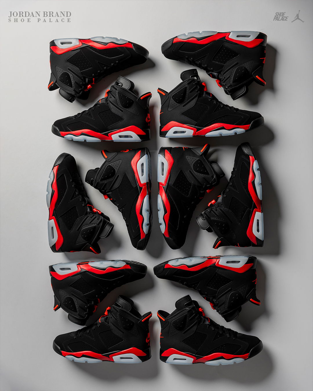 A collection of black and red sneakers arranged in a grid pattern.