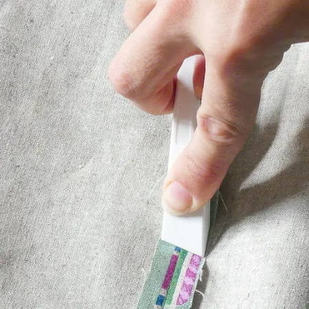 Finger pressing seams with a seam presser tool