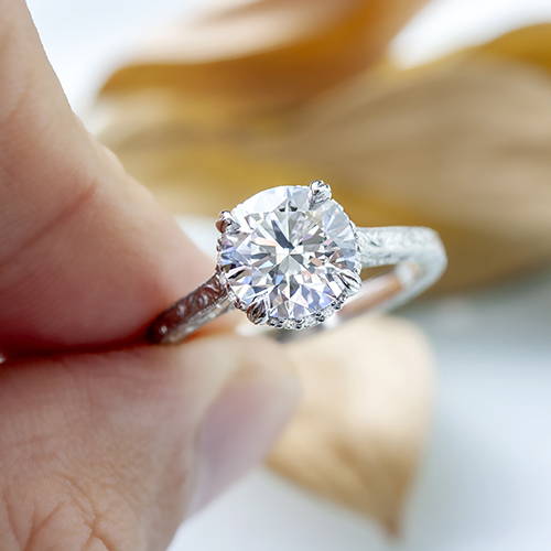 round brilliant diamond hidden halo engagement ring