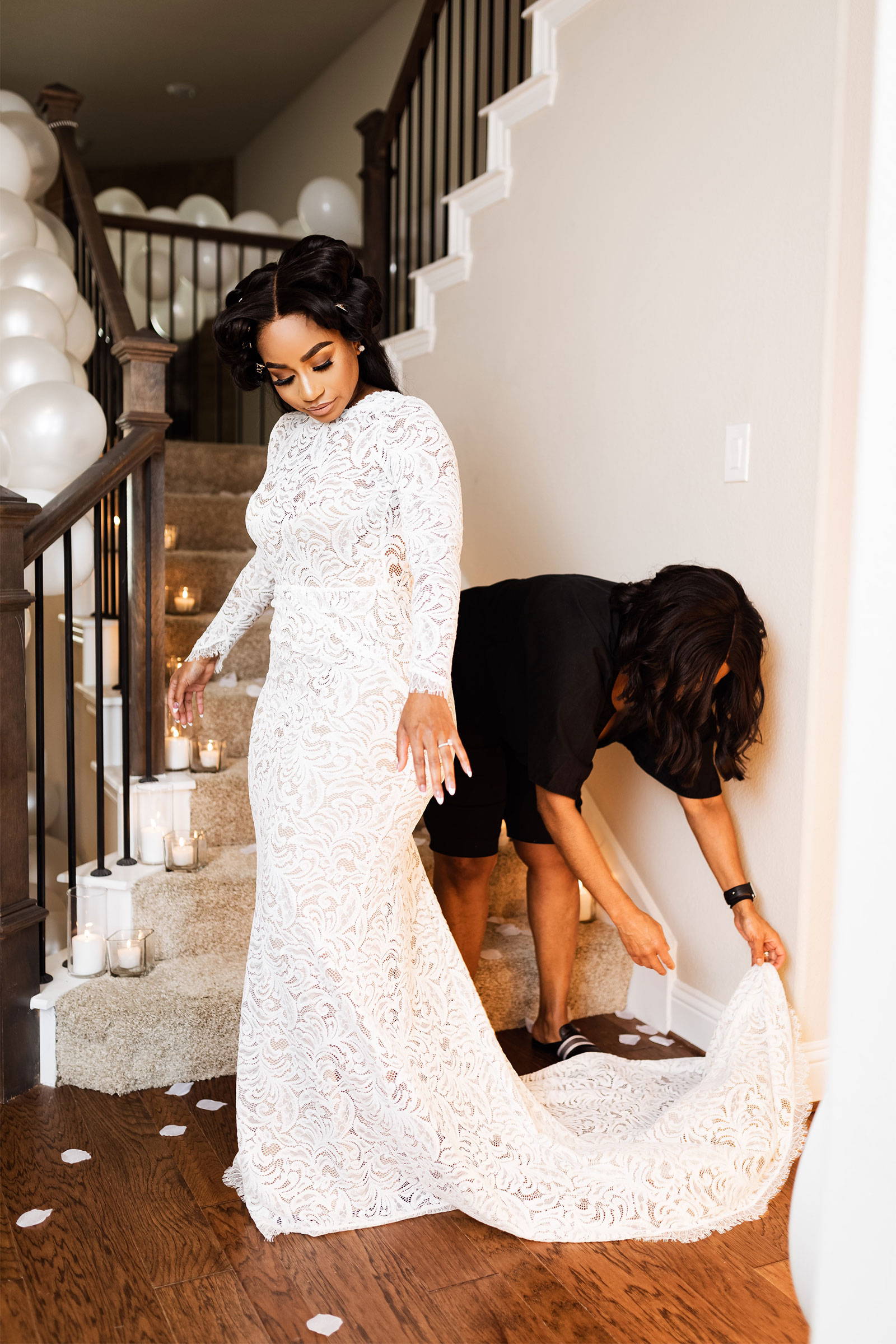 Grace bride with mother straightening her Orla wedding dress train