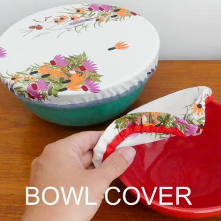 Two diy fabric bowl covers with bias-tape edges and fabric with a flower print