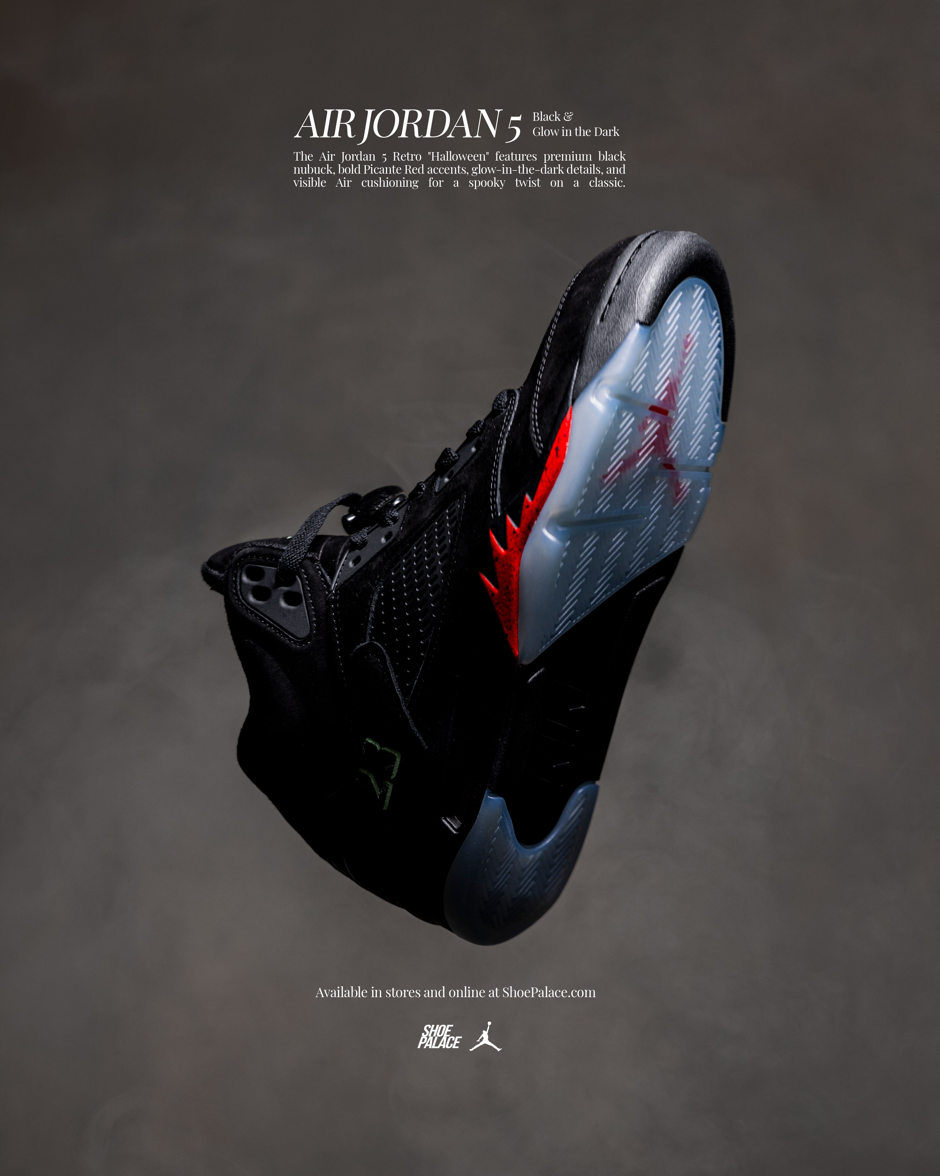 Air Jordan 5 sneaker with black and red colorway, displayed against a dark background.