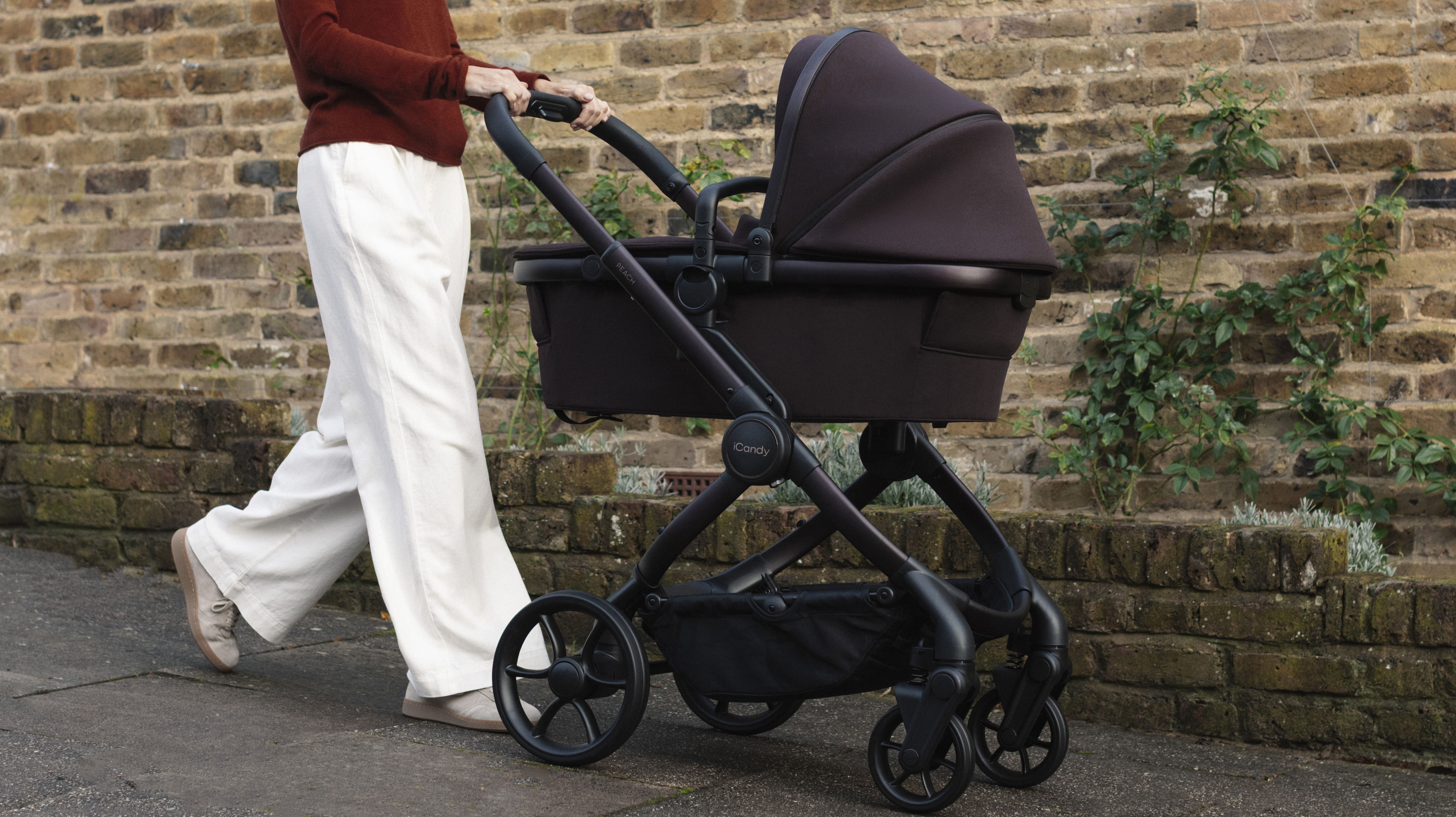 Woman pushing iCandy Peach 8