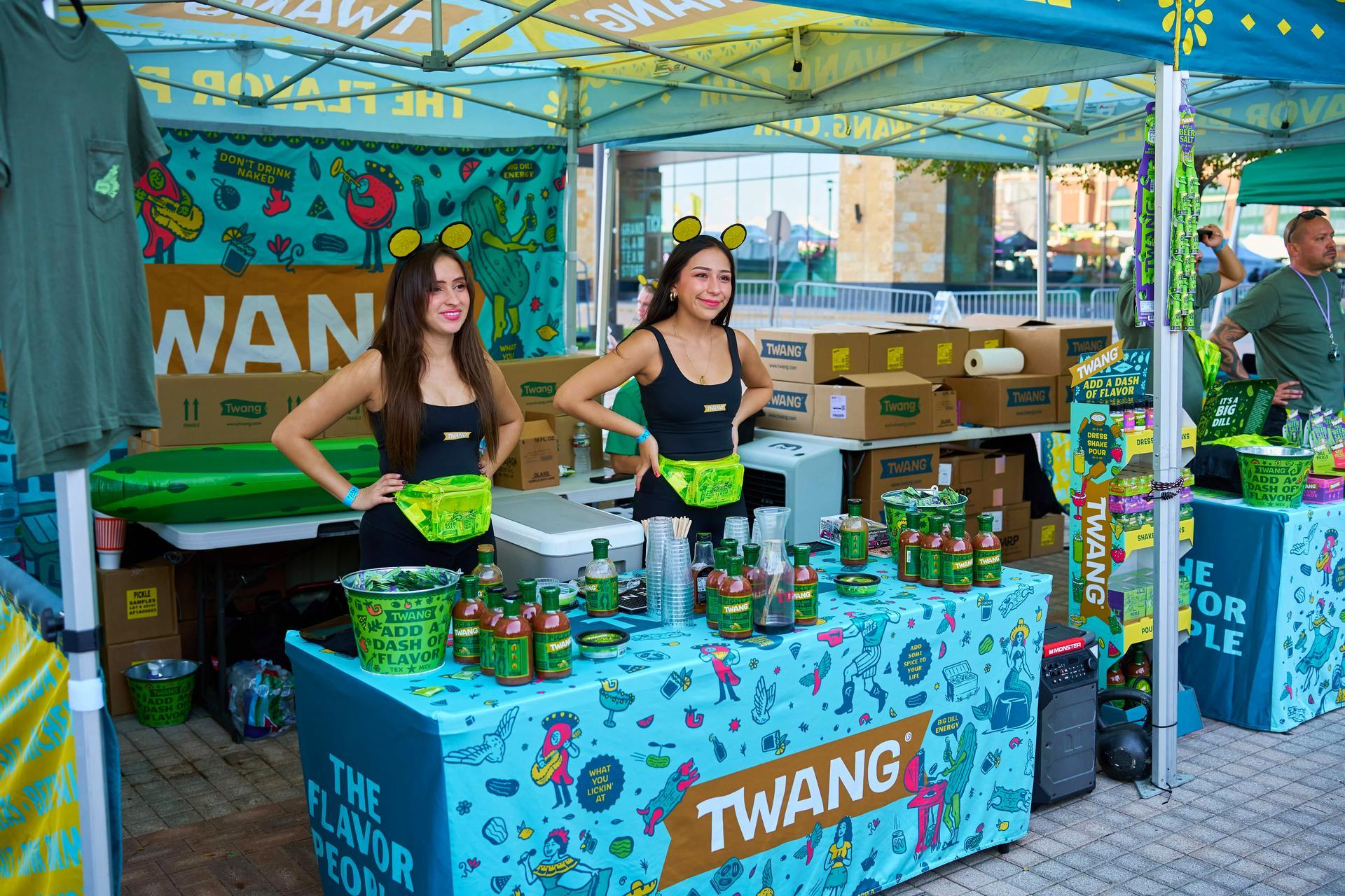 TWANG, the official stage sponsor of The Big Dill, hosts a custom co-branded vendor activation featuring Pickle Bloody Mary mixers and Pickle Beer Salt at The Big Dill pickle festival, Globe Life Field and Texas Live!, Arlington Texas 2025.