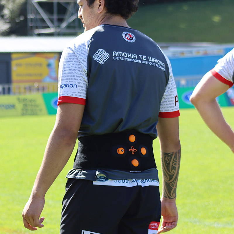 Myovolt lower back recovery device helping professional rugby players manage long-term muscle injury.