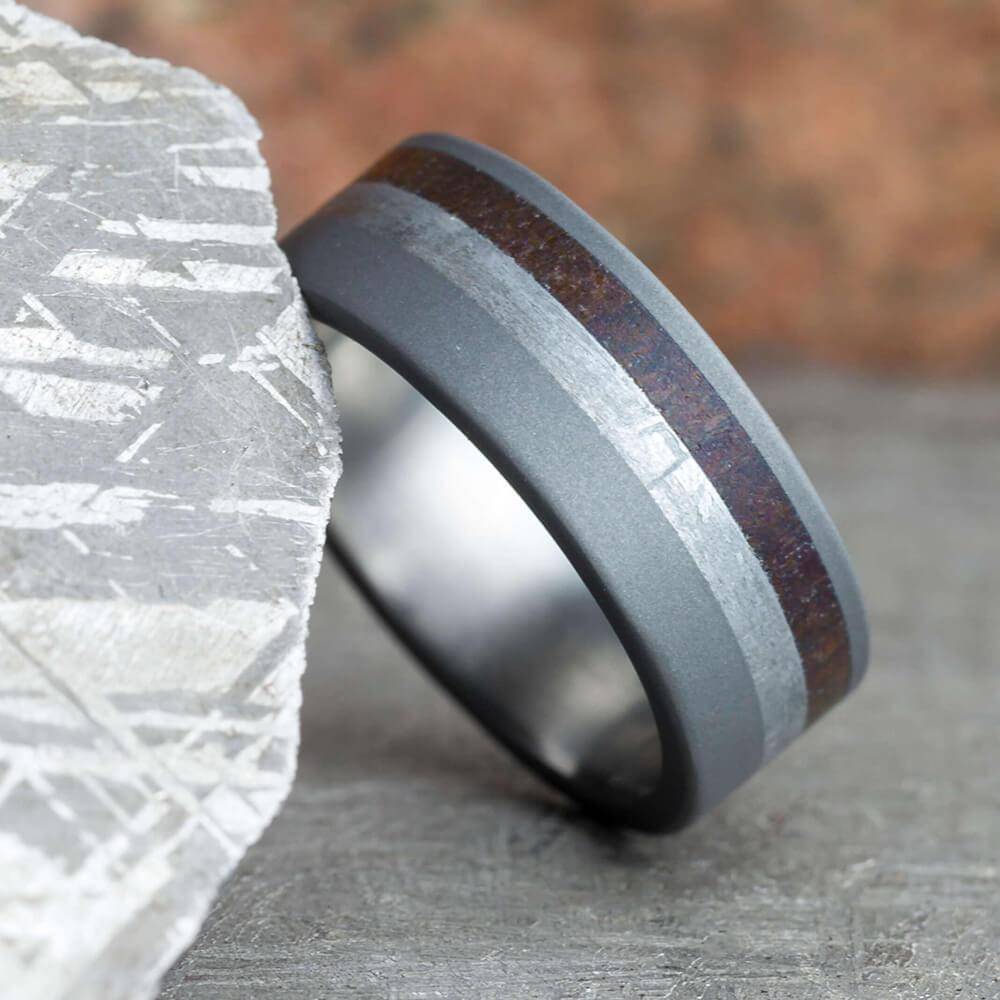 Sandblasted titanium ring with meteorite & dino bone inlays