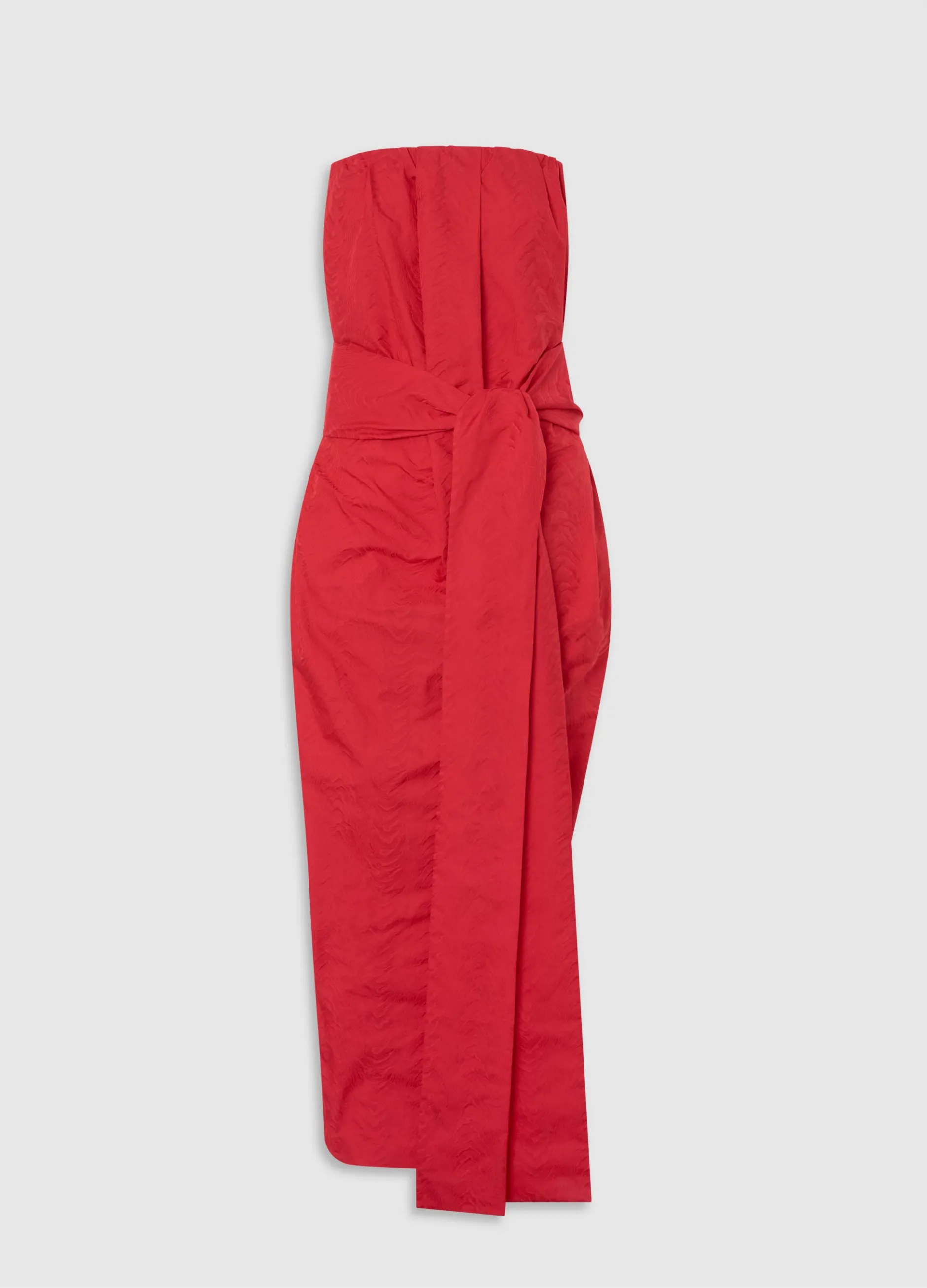 Red strapless dress with a tied waist detail.