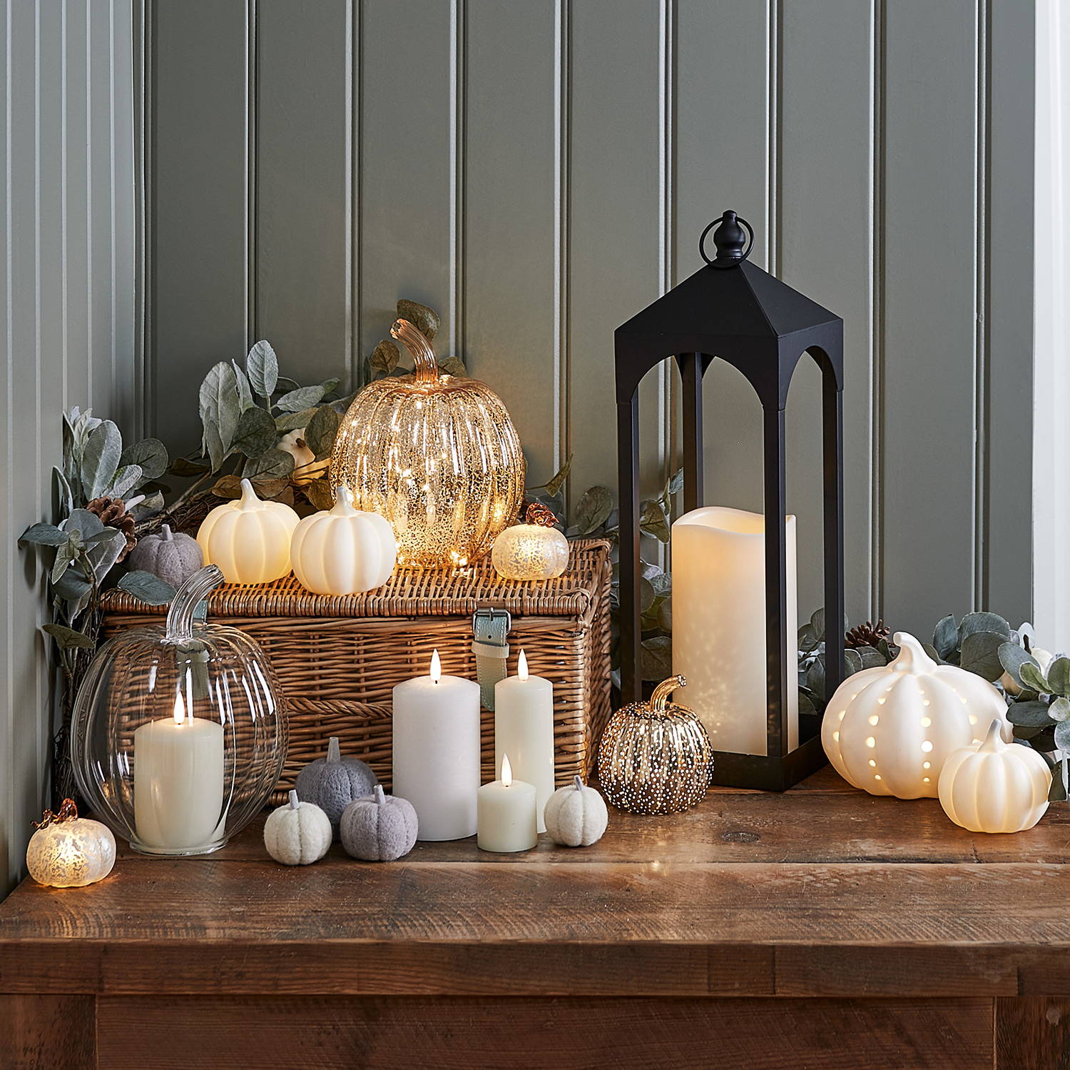 Autumnal entrance featuring a focus on seasonal product including wreaths, pumpkins and LED candles