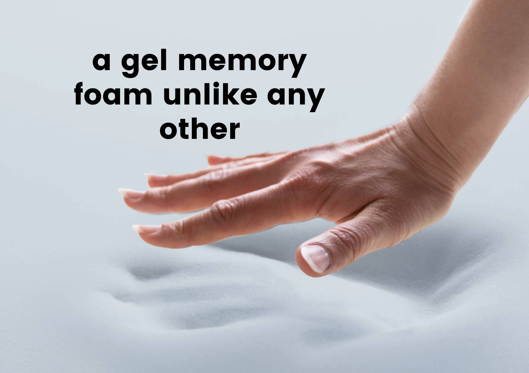A hand press on the gel memory foam leaving a hand print behind showing a gel memory foam unlike any other.