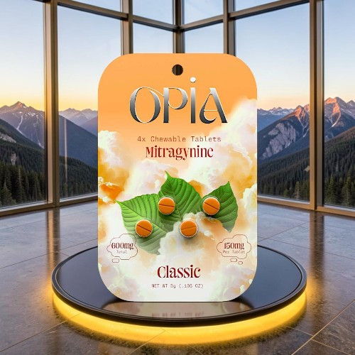 Product packaging for Opia's meringue, displayed in a scenic mountain setting.