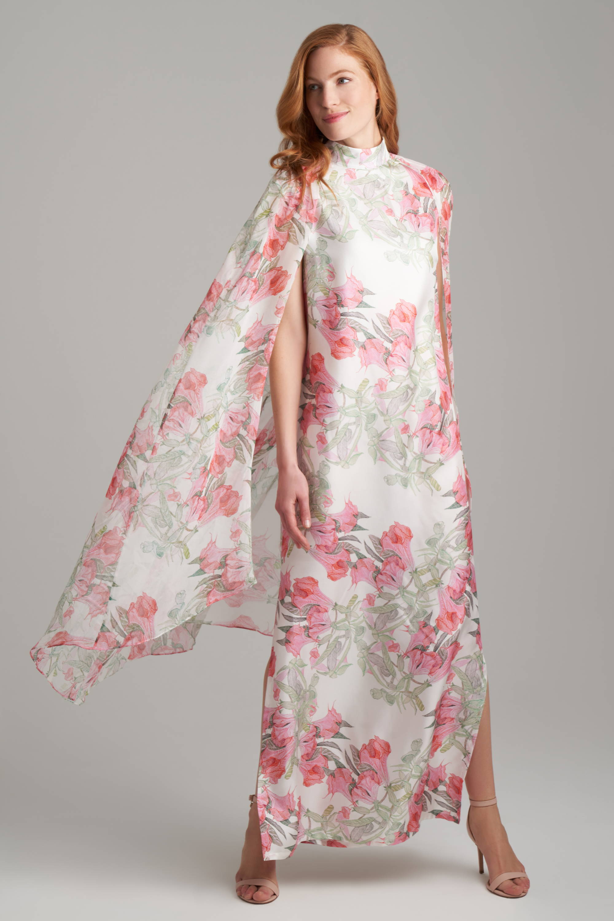 Woman wearing formal silk floral printed dress by Ala von Auersperg