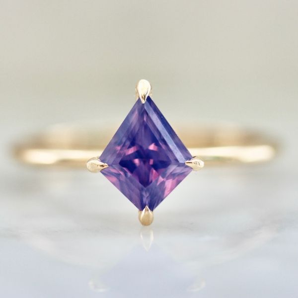 Purple kite cut opalescent sapphire ring in 14k yellow gold