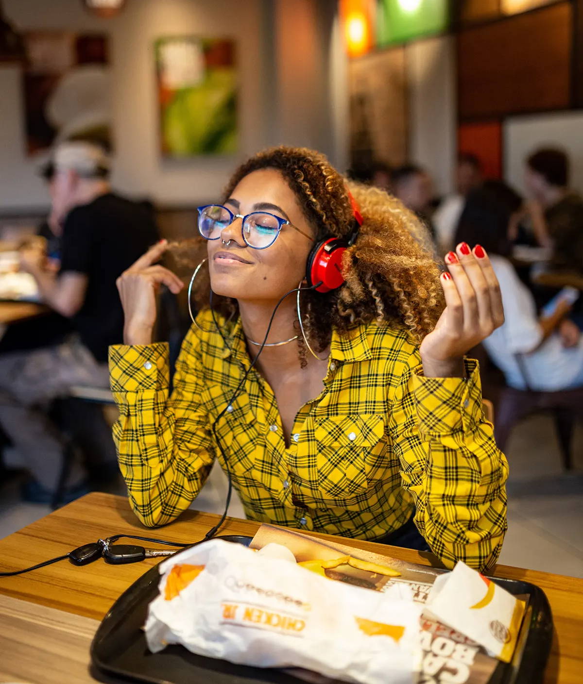 Woman grooving to music on her headphones