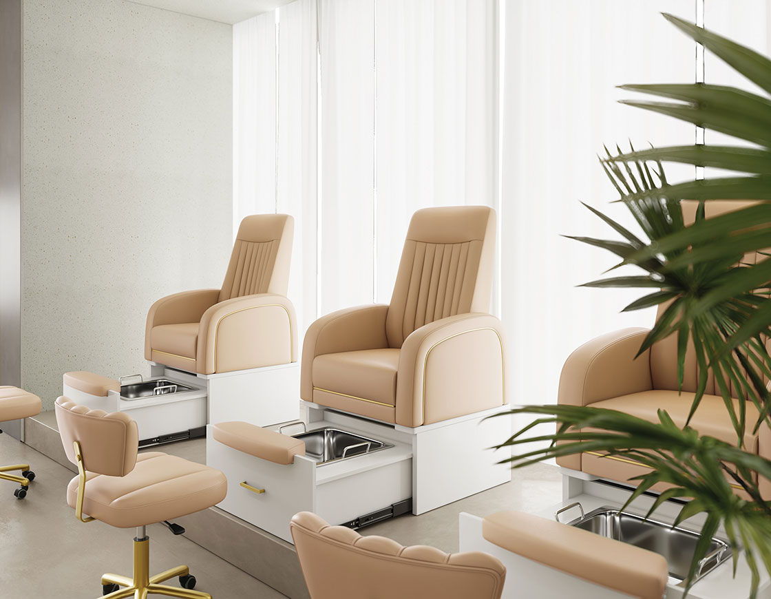 Modern nail salon with comfortable chairs and natural light.