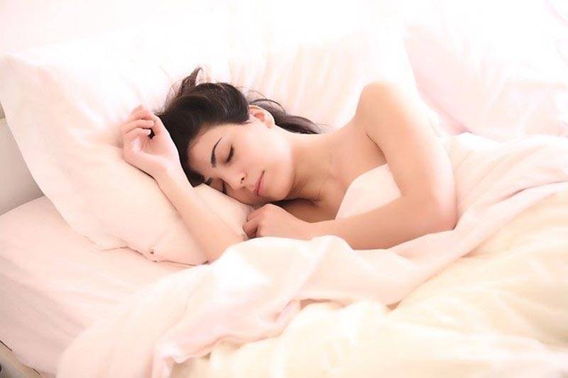 girl sleeping in silk sheets