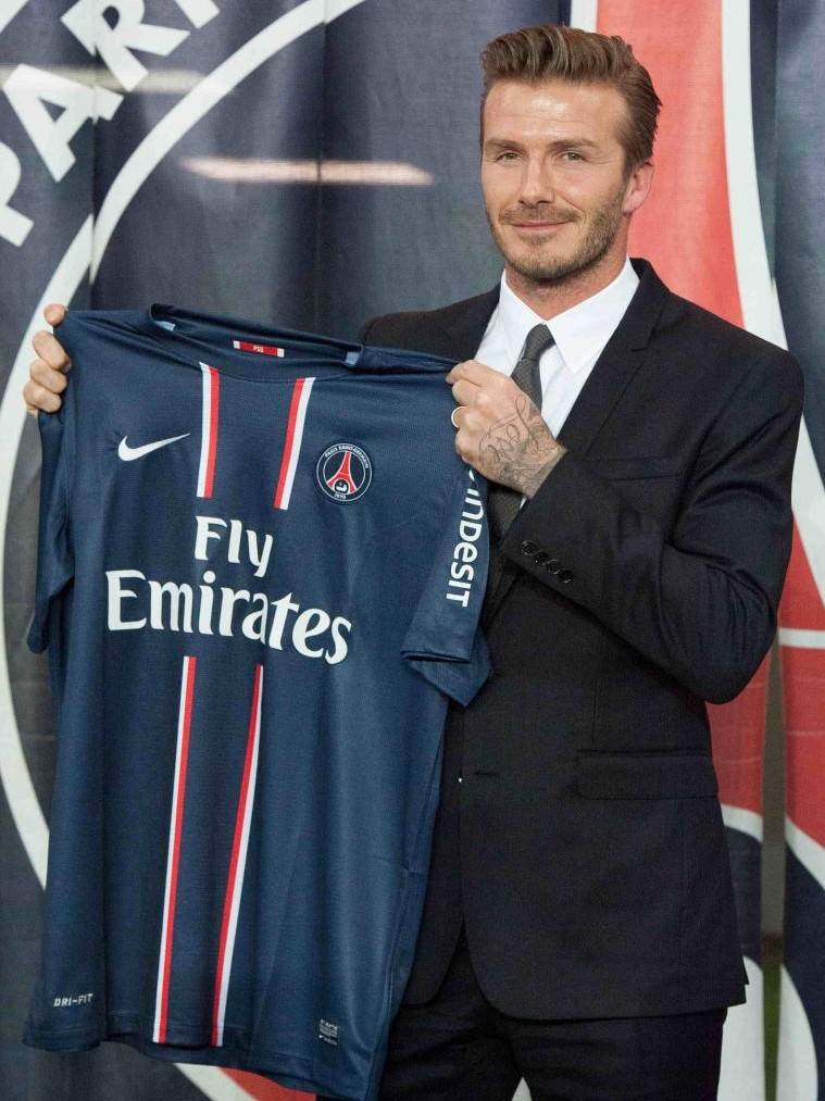 Soccer player David Beckham wears Daniel Hechter at a Paris Saint-Germain press conference in Paris
