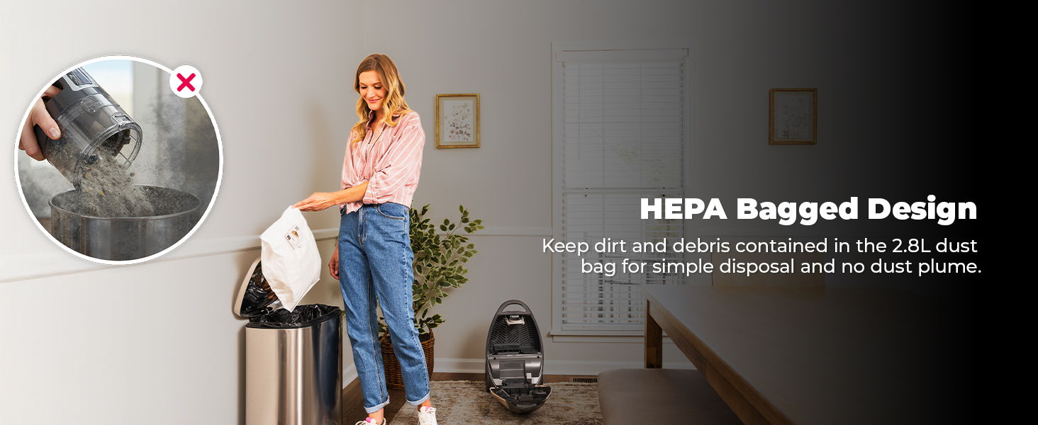 Woman using a vacuum cleaner with HEPA bagged design.