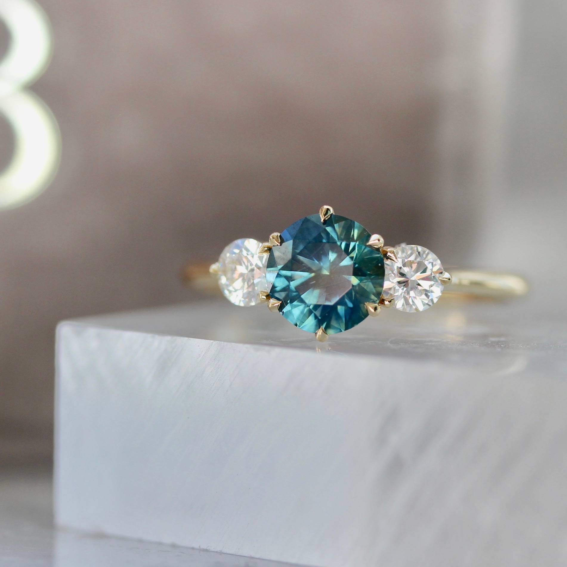 teal sapphire and diamond 3 stone engagement ring