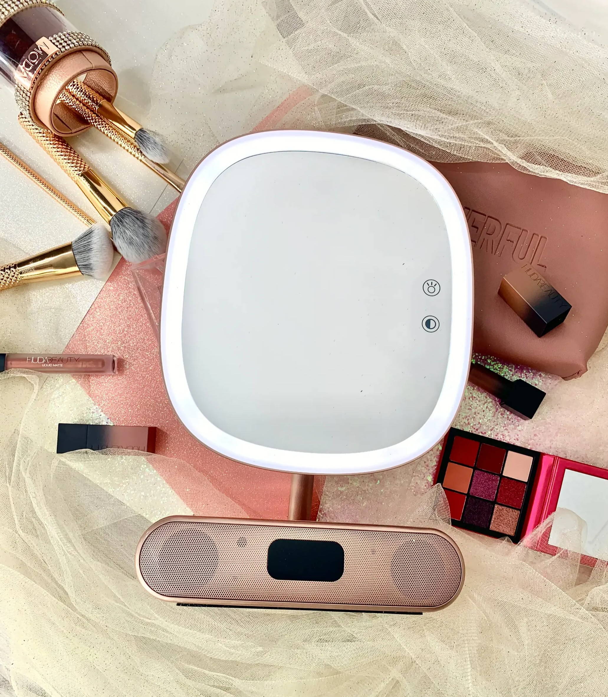 the rose gold melody mirror with makeup accessories