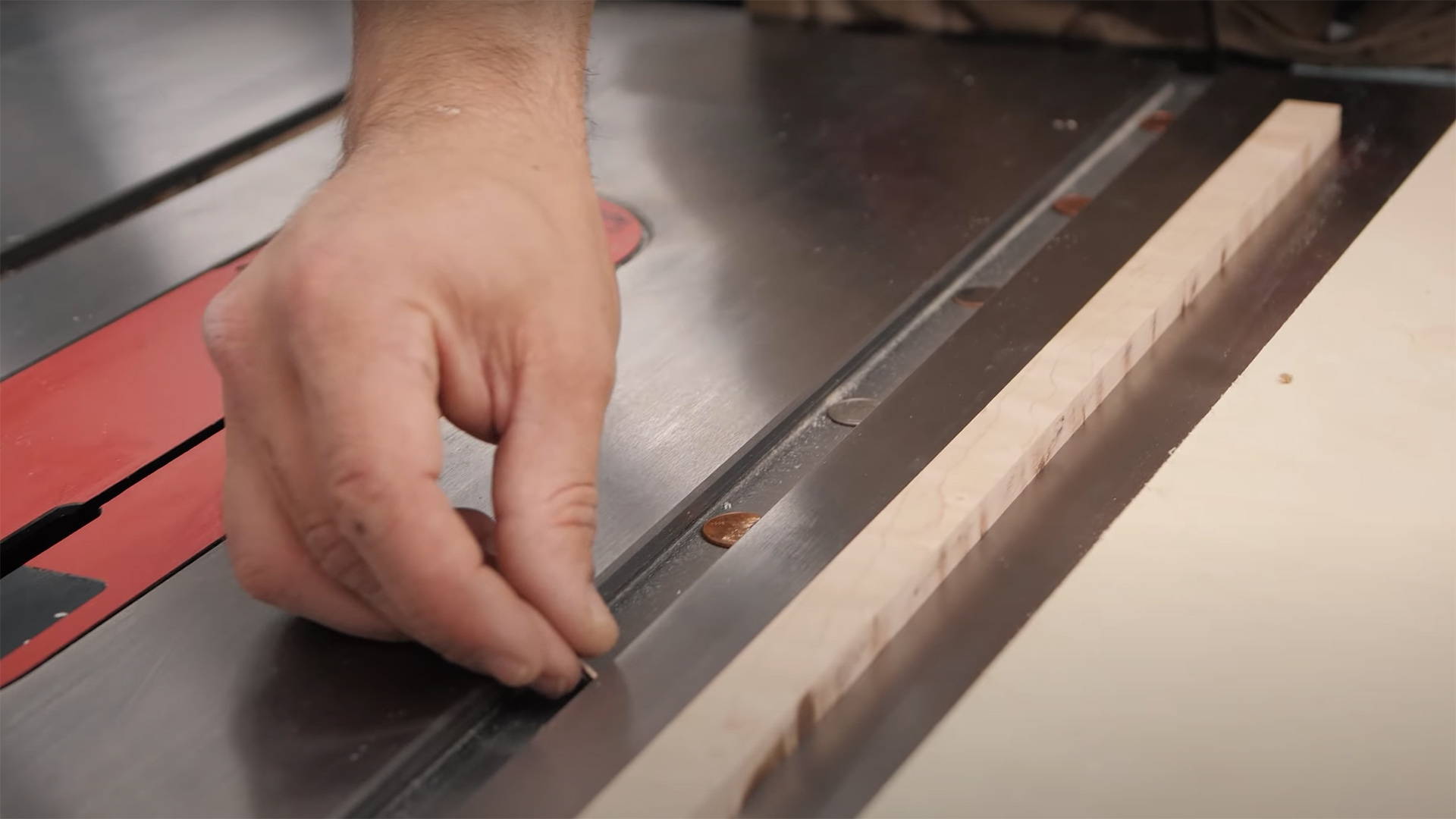 coins in table saw miter slot