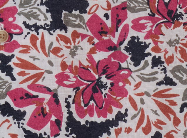 Colorful floral fabric pattern with pink, orange, and navy elements.