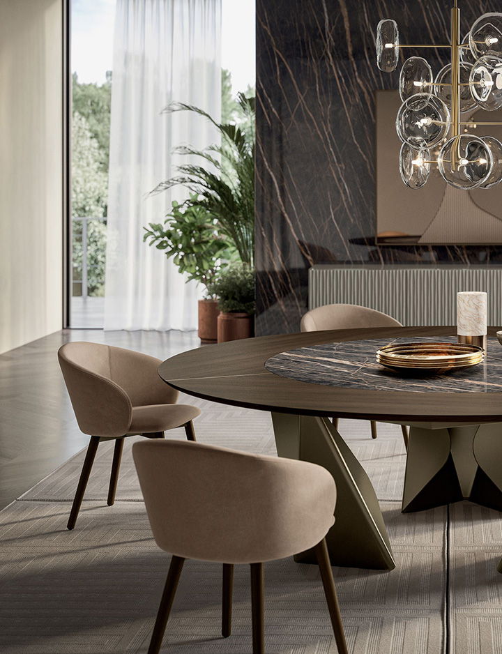 Bontempi Casa chair and dining table image. Round table with golden steel legs