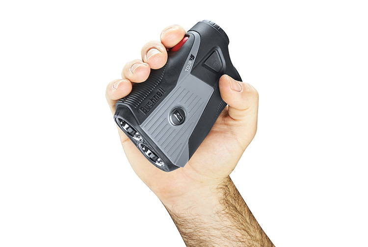 Hand holding a Bushnell golf laser rangefinder