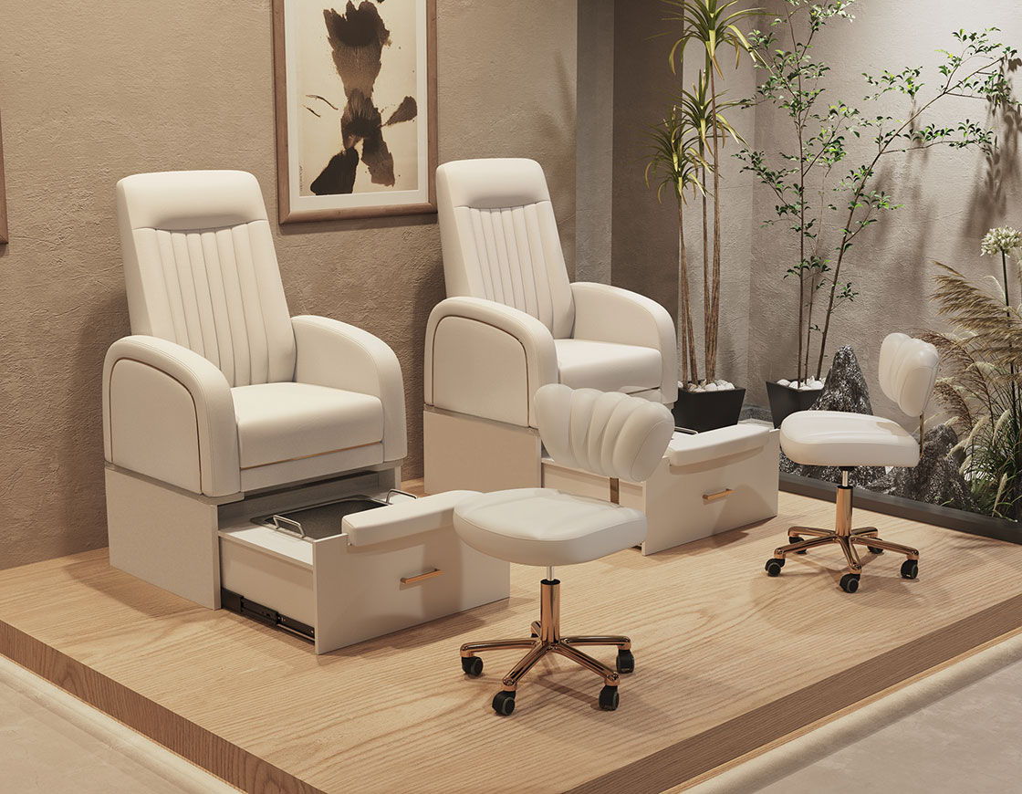 Two white pedicure chairs in a stylish salon setting.