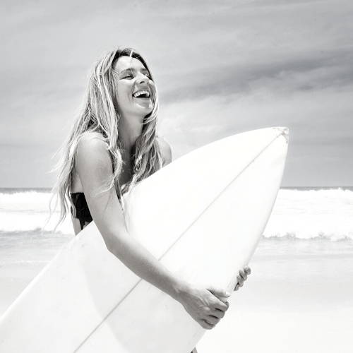 Girl Surfer Holding Surfboard