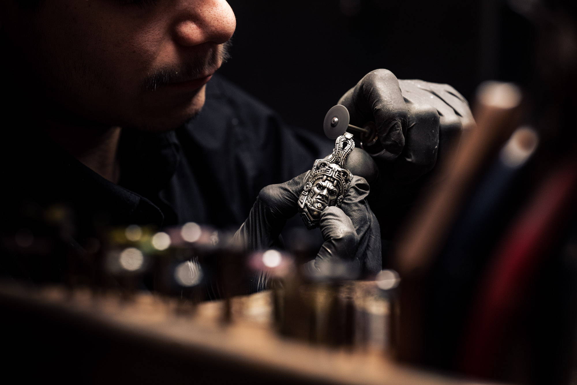 The solid sterling silver Ocelotl Aztec Pendant being crafted by a NightRider jeweler