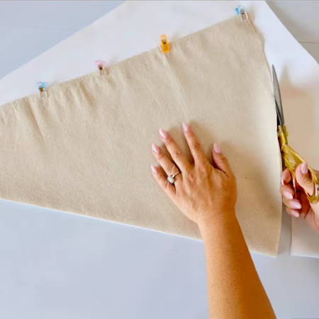 Cut lining fabric for flower bag using outer fabric as a template