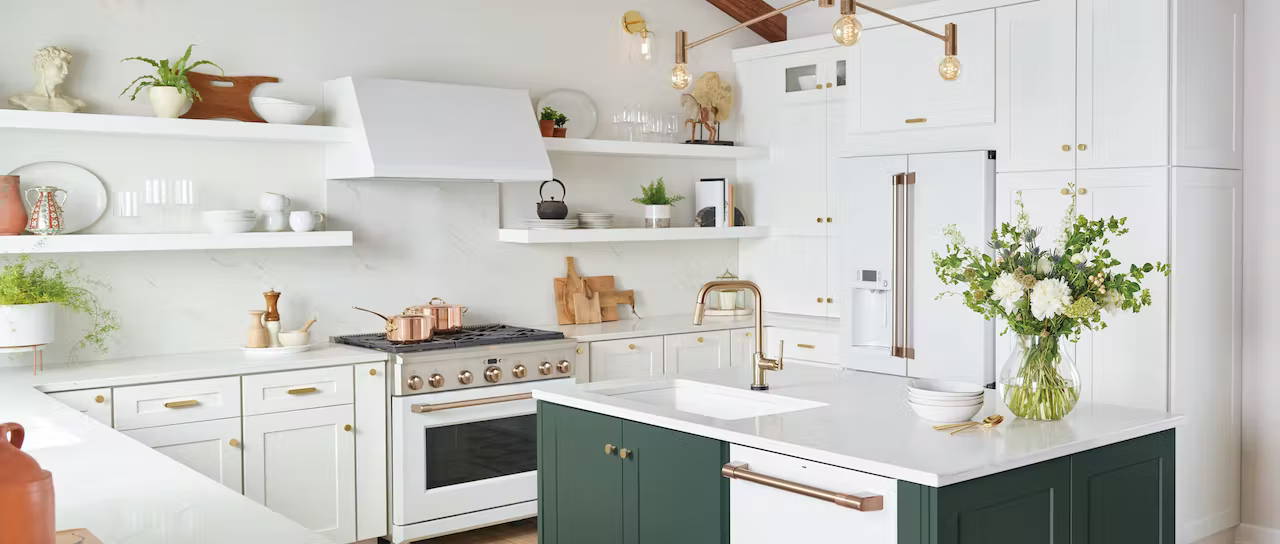 white matte kitchen with brushed bronze, stainless steel, and copper